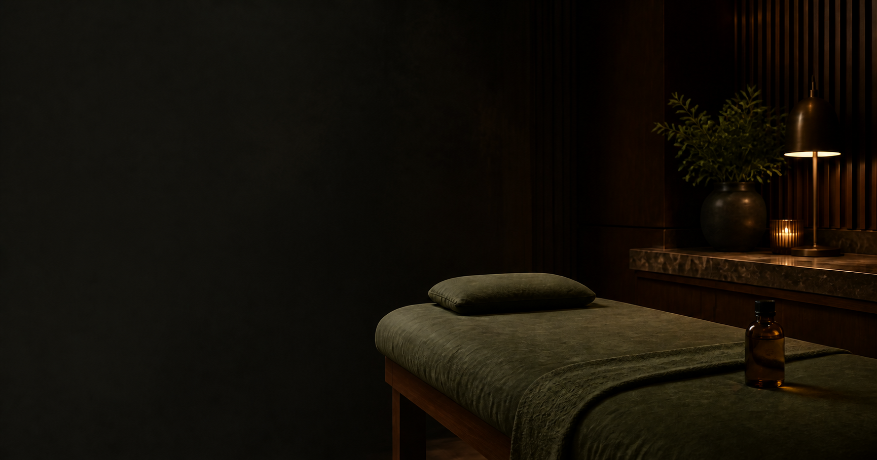 A refined, warmly lit private massage room